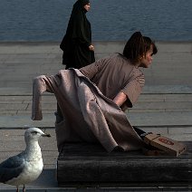 Seagull and two women